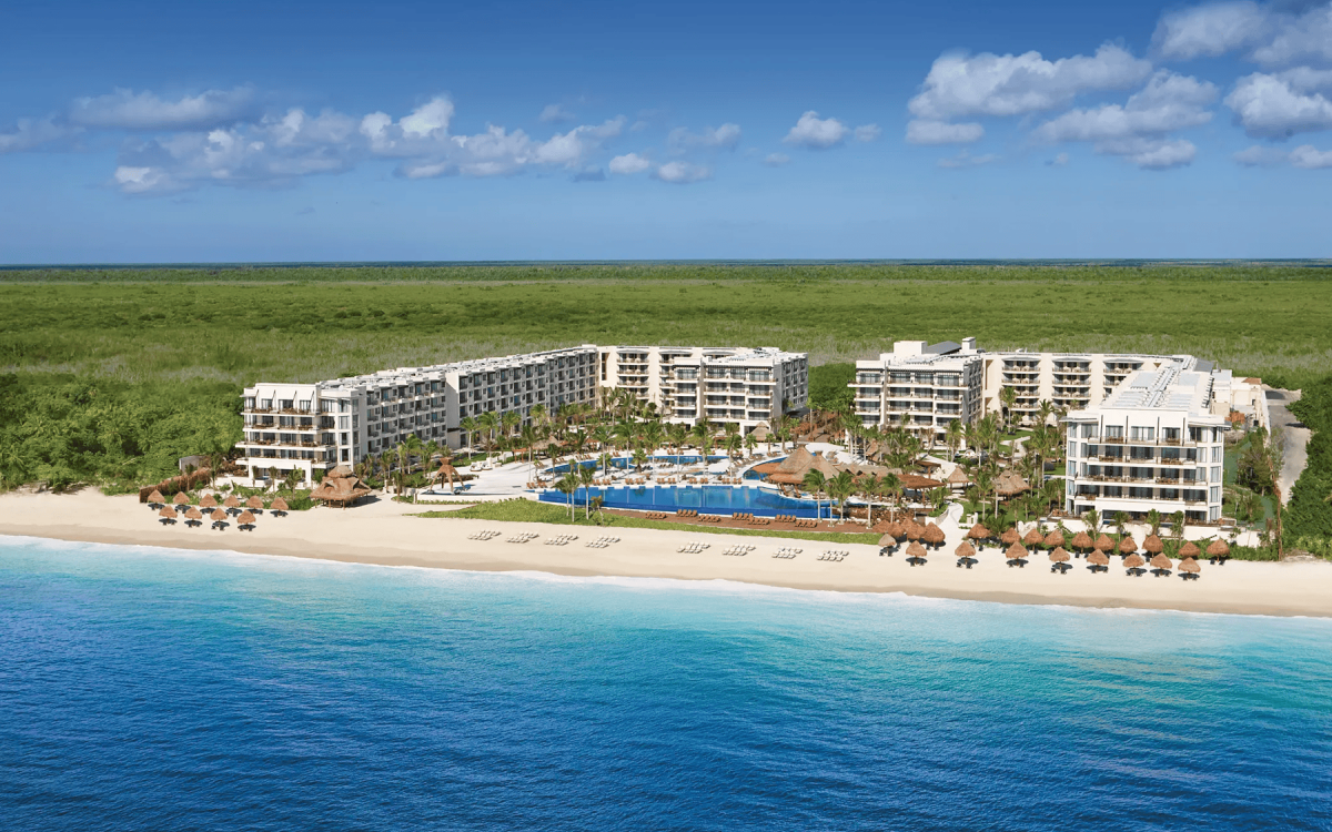 Beachfront pools and tropical grounds at Luxury Riviera Cancún Resort & Spa